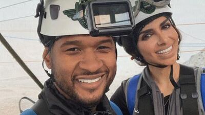 US rapper Usher taking on the world's longest zipline at the top of Jabal Jais, Ras Al Khaimah with Sara Al Madani on January 26. Instagram / Sara Al Madani