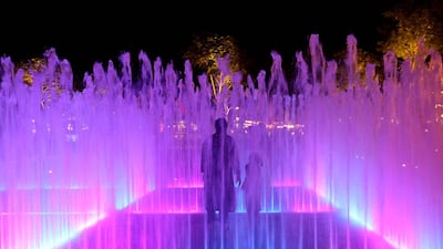 People play in the fountains at Town Square Park in Dubai. Chris Whiteoak / The National