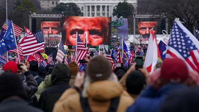 Trump supporters participate in a rally in Washington before the ugly scenes of the Capitol riots. AP Photo