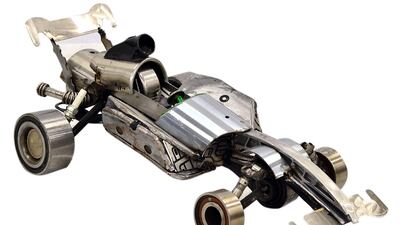 Art imitates its origins in '3-Wheel Race Car'. Al Tayer Motors