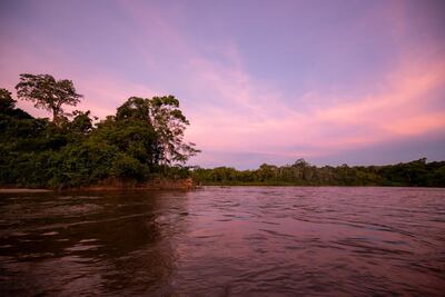 Searching for endangered arapaima on the Rewa River. Courtesy Jamie Lafferty