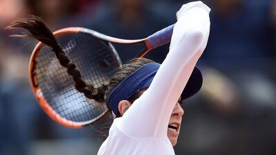 Christina Michale of the US returns the ball to Serena Williams of the US during their match at the Italian Open. Filipo Monteforte / AFP