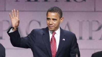 Barack Obama greets delegates before speaking at the American Israel Public Affairs Committee policy conference in Washington.