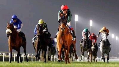 Frankie Dettori triumphs on Fox Hunt, centre, at Meydan Racecourse last night.