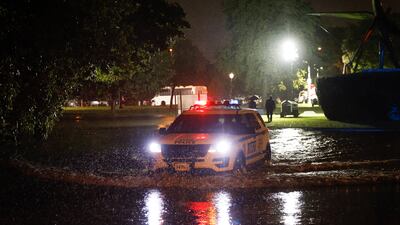 A police car on a street flooded by heavy rain as remnants of Hurricane Ida hit the area in the Queens borough of New York, New York. EPA