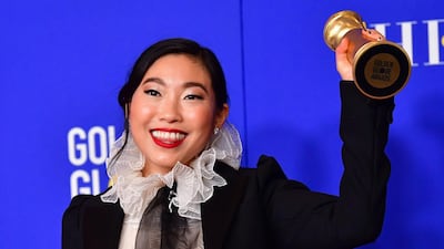 Awkwafina poses with her award for Best Performance by an Actress in a Motion Picture - Musical or Comedy for her role in 'The Farewell' during the 77th annual Golden Globe Awards on January 5, 2020, at The Beverly Hilton hotel in Beverly Hills, California. AFP