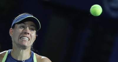 Angelique Kerber of Germany returns the ball to Czech Barbora Strycova during the second day of the WTA Dubai Duty Free Tennis Championship. Karim Sahib / AFP