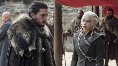 Kit Harington, left, and Emilia Clarke in the season finale of Game of Thrones. Macall B. Polay / HBO via AP