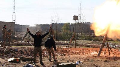 Iraqi rapid response forces fire mortar shells towards ISIL positions in Wahda district of eastern Mosul on January 6, 2017. Alaa Al Marjani / Reuters