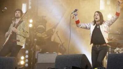 The guitarist Serge Pizzorno and the singer Tom Melghan of Kasabian perform at last month's Glastonbury Festival.