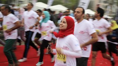 Egyptian runners participate in Cairo's annual half marathon in the Heliopolis district of Cairo on April 17. Amr Nabil/AP