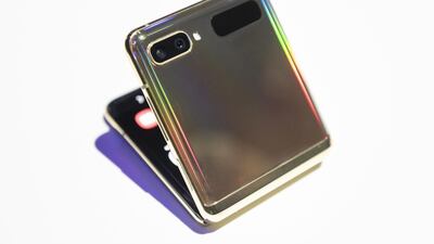 A Samsung Electronics Co. Galaxy Z Flip smartphone is displayed during the Samsung Unpacked product launch event in San Francisco, California, U.S. on Tuesday, Feb. 11, 2020. Samsung is starting a new decade with a new chief in charge of its mobile business, but it's doing it in the same old fashion: by leaning into its semiconductor advantage to overwhelm consumers with unmatched specs on its latest Galaxy devices. Photographer: Michael Short/Bloomberg