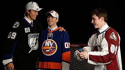 Tavares is flanked by the second pick, Victor Hedman of the Tampa Bay Lightning, left, and Matt Duchene, who was picked by the Colorado Avalanche with the third pick in Montreal.