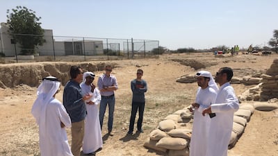 Abu Dhabi Tourism and Culture Authority archaeologists and consultants at the Hili 8 site in Al Ain.