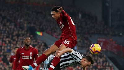 Liverpool's Trent Alexander-Arnold in action with Newcastle United's Matt Ritchie. Action Images via Reuters