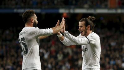 Gareth Bale, right, scored a hat-trick on Zinedine Zidane's debut as Real Madrid manager. Susana Vera / Reuters
