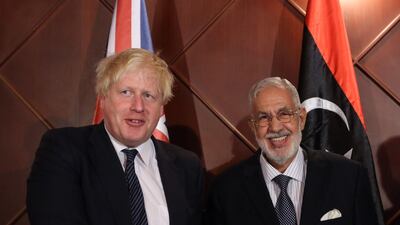 Boris Johnson, with Mohamed al-Taher Siala, Foreign Minister of the UN-backed Government of National Accord, called on leaders Friday to suppress their "selfish interests" following his trip to Libya AFP PHOTO / STR