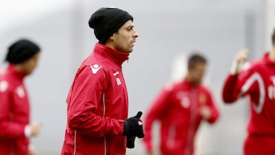 Monaco's Bulgarian forward Dimitar Berbatov takes part in a training session on Friday in La Turbie, southeastern France. Valery Hache / AFP
