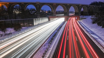 Vehicles cross under the Bahrebachmuehle viaduct while driving in the morning on the the A4 highway in Chemnitz, Germany. AP