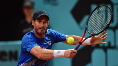 Andy Murray plays a backhand during his second-round victory over Canadian Denis Shapovalov at the Madrid Open at La Caja Magica on May 03, 2022. Getty