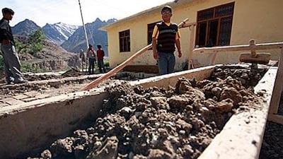 The greenhouse outside the monastery was built by stacking layers of mud.