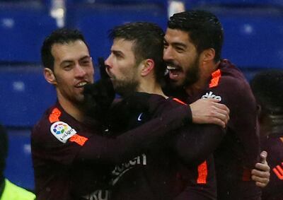 Barcelona have an established network of youth teams that fostered the careers of players such as Sergio Busquets, left, and Gerard Pique, centre. Reuters