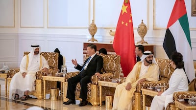Sheikh Mohammed bin Rashid talks to Peng Liyuan while Sheikh Mohammed bin Zayed is in conversation with Xi Jinping. Crown Prince Court - Abu Dhabi