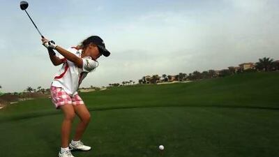 The 10-year-old Leia Holden plays a shot during the Abu Dhabi Schools and Club League Championships at the Saadiyat Beach Golf Club in Abu Dhabi.