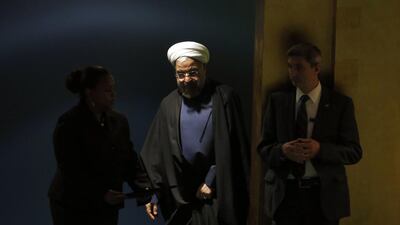 Iranian president Hassan Rouhani is escorted to the podium for his address to the 69th United Nations General Assembly at United Nations Headquarters in New York on September 25. Mike Segar / Reuters