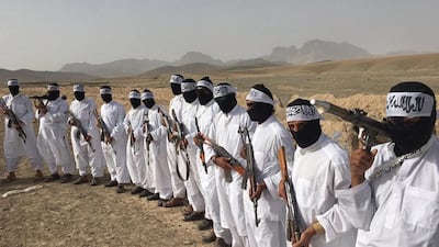 Followers of a breakaway Taliban faction, who call themselves suicide bombers, stand guard during a gathering,in Zabul province, southern Afghanistan on August 15,2016. The faction, known as Mahaaz-e-Dadullah, appointed aMullah Emdadullah Mansoor as leader Mirwais Khan / AP