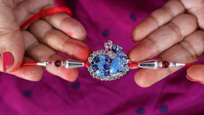 The rakhi or the charm tied around the wrist has also evolved with the times. EPA