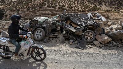 Another crushed car on a mountain road in Talat N'Yaaqoub. Getty Images