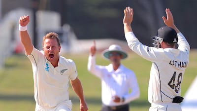 New Zealand bowler Neil Wagner, left, celebrates after dismissing England's Stuart Broad to win the first Test at Mount Maunganui. AFP