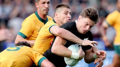 Australia's James O’Connor tackles New Zealand's Beauden Barrett. AFP
