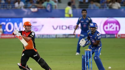 David Warner, left, scored a valiant 65 for Sunrisers Hyderabad in Dubai on Wednesday. Pawan Singh / The National