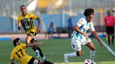 Al-Entag al-Harby player Abdel Rahman Boudy, left, in action against Pyramids FC player Keno during the Egyptian Premier League match in Cairo, Egypt. EPA