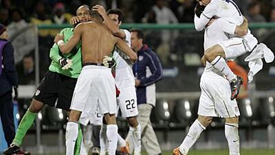 Landon Donovan, right, and his US teammates celebrate at the end of their Confederations Cup semi-final against Spain in Bloemfontein.