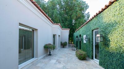 Boundary walls have been covered to look like a classic garden maze. Courtesy Luxury Property