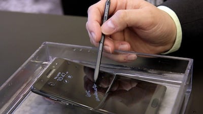 The Galaxy Note 7 shows off its waterproofing ability. Richard Drew / AP Photo