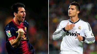 Barcelona's Lionel Messi, left, and Real Madrid's Cristiano Ronaldo scored both goals for their respective clubs in the 2-2 draw. Lluis Gene, Quique Garcia / AFP;