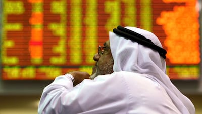 A UAE Investor at the stock exchange in the Dubai Financial Market. Ali Haider/EPA