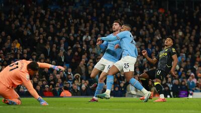 Aston Villa's Ollie Watkins scores past Ederson. Reuters