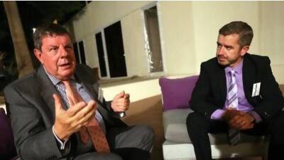 Gerard Flynn (left) and Macartan Mulligan from Xraydata.com talk about their company's efforts to stop cyber bullying in the UAE. Sammy Dallal / The National