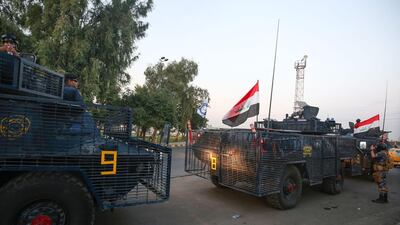 Iraqi police are seen deployed in Baghdad's predominantly Shiite Sadr City. Demonstrations across Baghdad and the south have spiralled into violence over the last week, with witnesses reporting security forces using water cannons, tear gas and live rounds and authorities saying "unidentified snipers" have shot at protesters and police. On Sunday evening a mass protest in Sadr City in east Baghdad led to clashes that medics and security forces said left 13 people dead. AFP