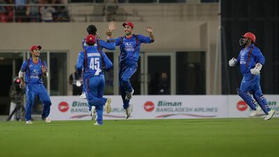 Afghanistan cricketers will swap coloured clothing for Test whites on Thursday. AP