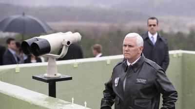 US vice president Mike Pence looks towards North Korea from the Observation Post Ouellette in the Demilitarized Zone (DMZ), near Panmunjom, which has separated the two Koreas since the Korean War. Lee Jin-man / AP Photo