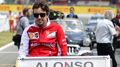 Ferrari driver Fernando Alonso arrives at Sunday's Spanish Grand Prix. Tom Gandolfini / AFP / May 11, 2014