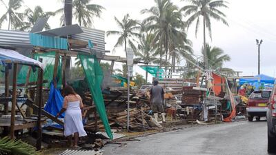 A fruit and vegetable market damaged by Cyclone Winston reopen. Sarah Boxall — CARE Australia / Handout via Reuters