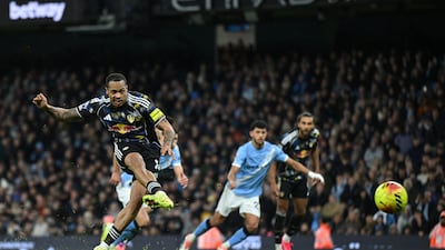 Leeds' Lukas Nmecha sees his penalty saved only to score from the rebound to make it 2-2. Getty Images