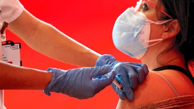 A teacher in Valencia, Spain, receives a dose of the Covid-19 vaccine made by AstraZeneca. EPA